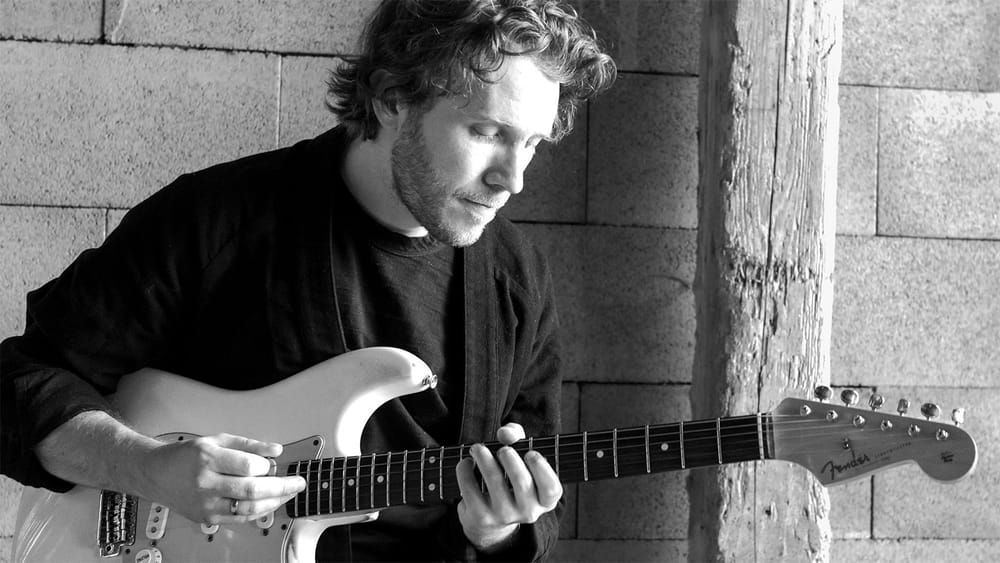 Aaron playing guitar