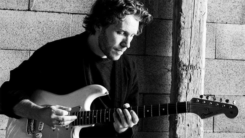 Aaron playing guitar