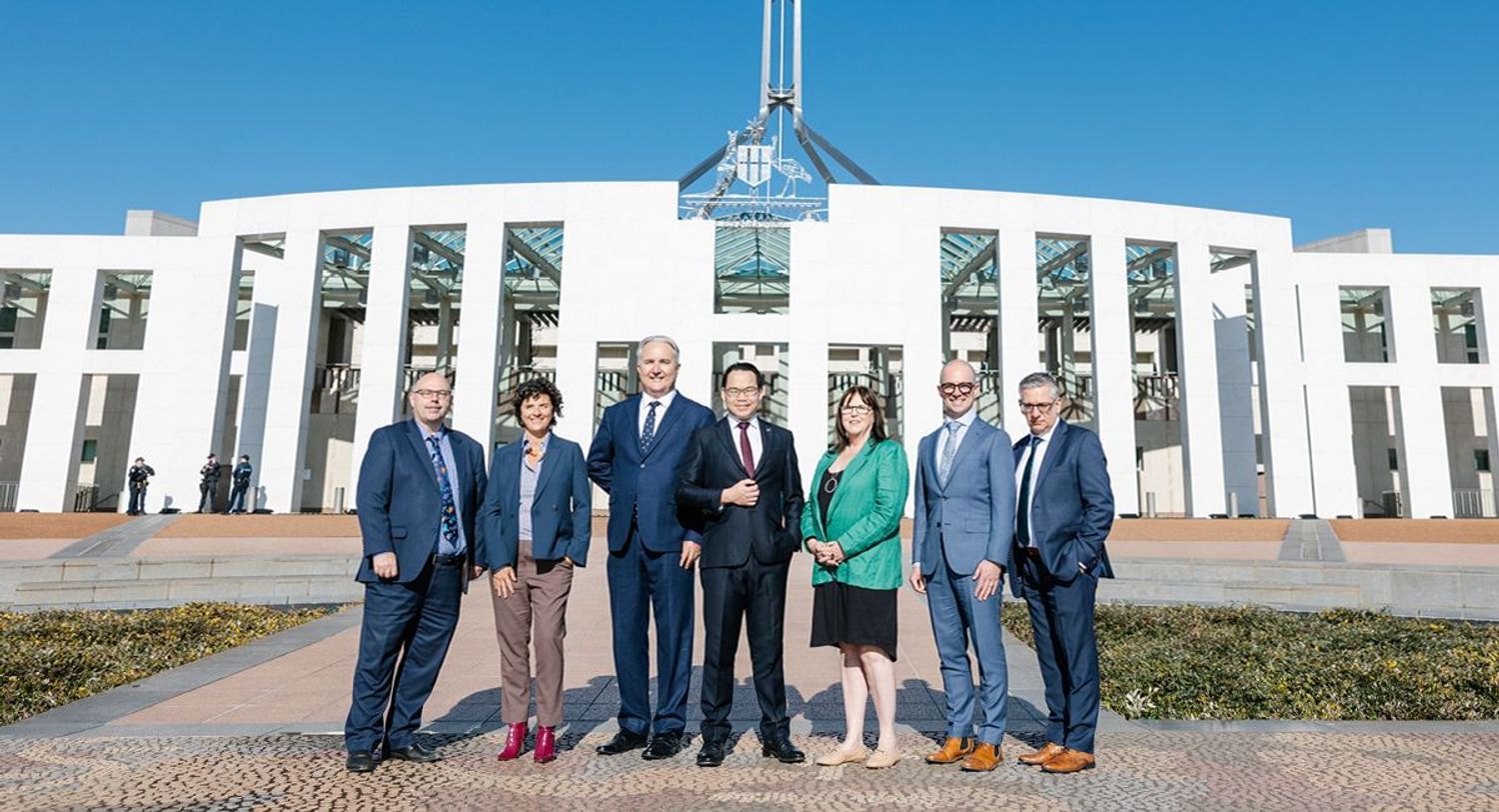 Federal Executive and ADA CEO and Deputy CEO standing in front of Parliament House, Canberra.