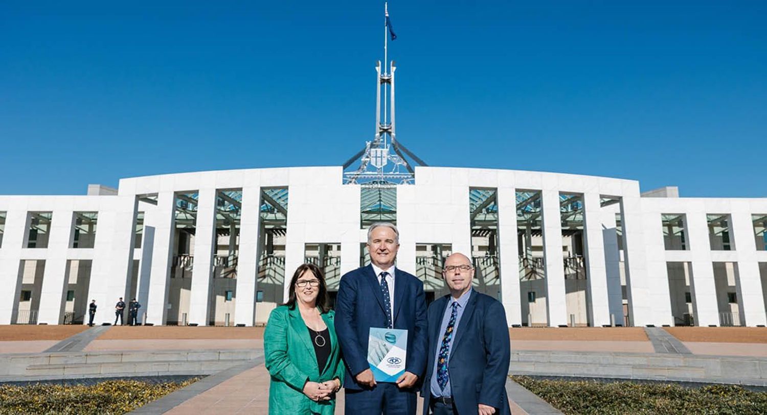 ADA CEO, Deputy CEO and President in front of Parliament House in Canberra