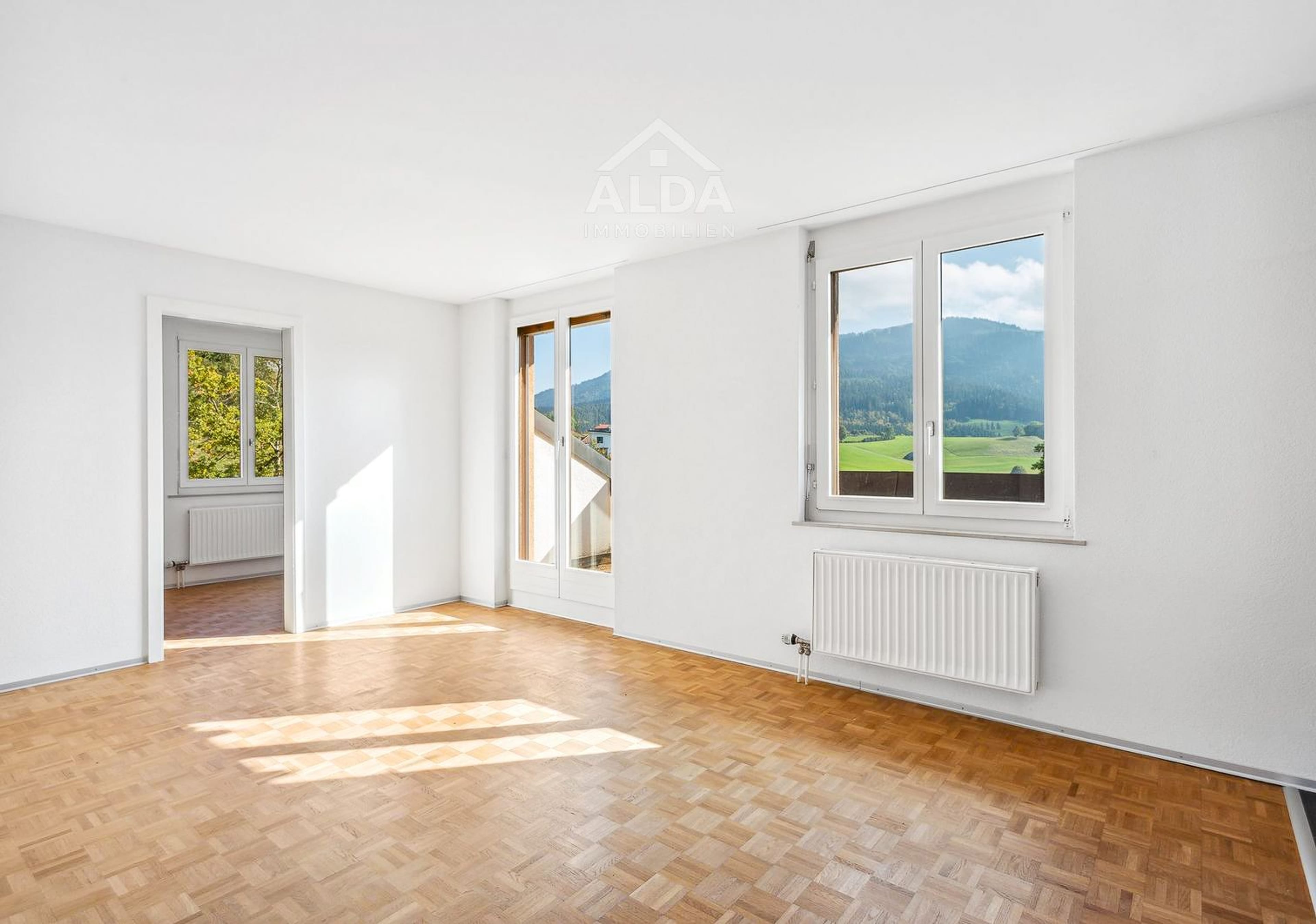 Helle 2.5-Zimmer-Attikawohnung mit Weitsicht in Plasselb - 1