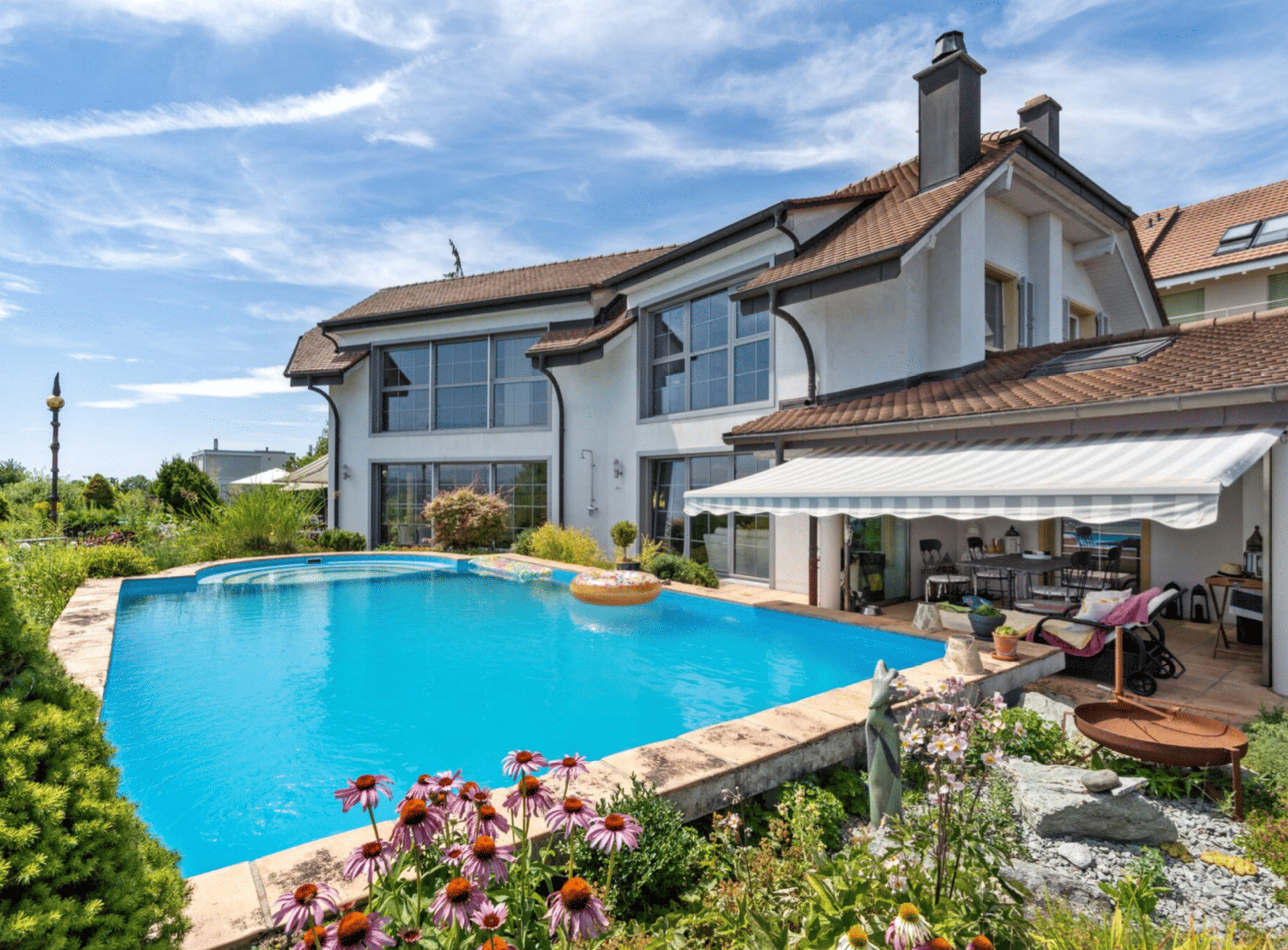7.5-Zi.-Terrassenhaus mit Pool und Seesicht in Bellerive kaufen - Bild 1
