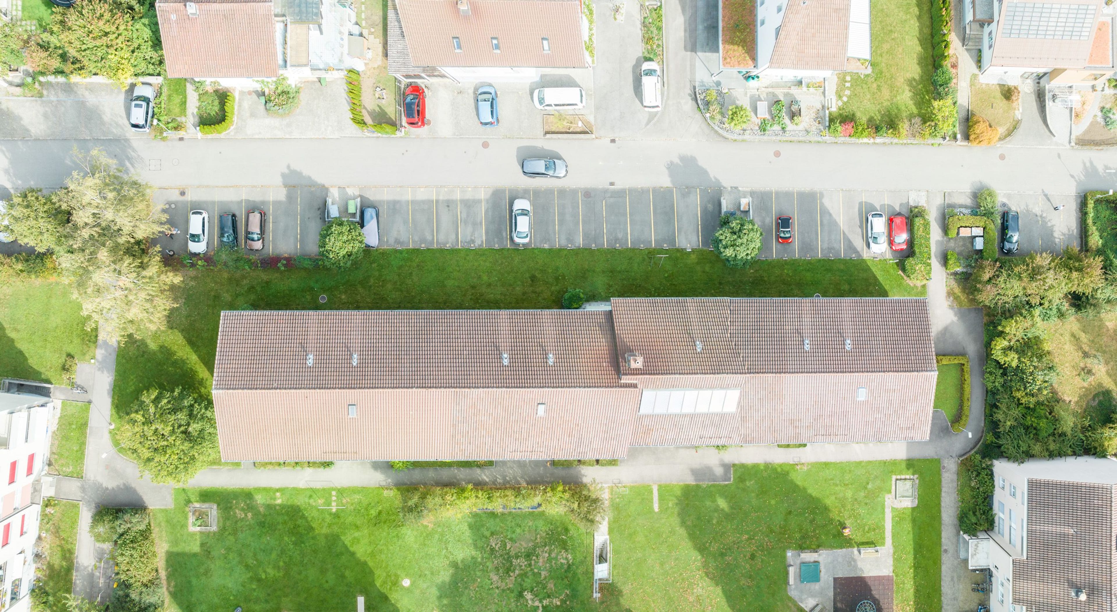 Anlageobjekt: Vier Mehrfamilienhäuser mit 24 Wohnungen und 28 Aussenparkplätzen - 3
