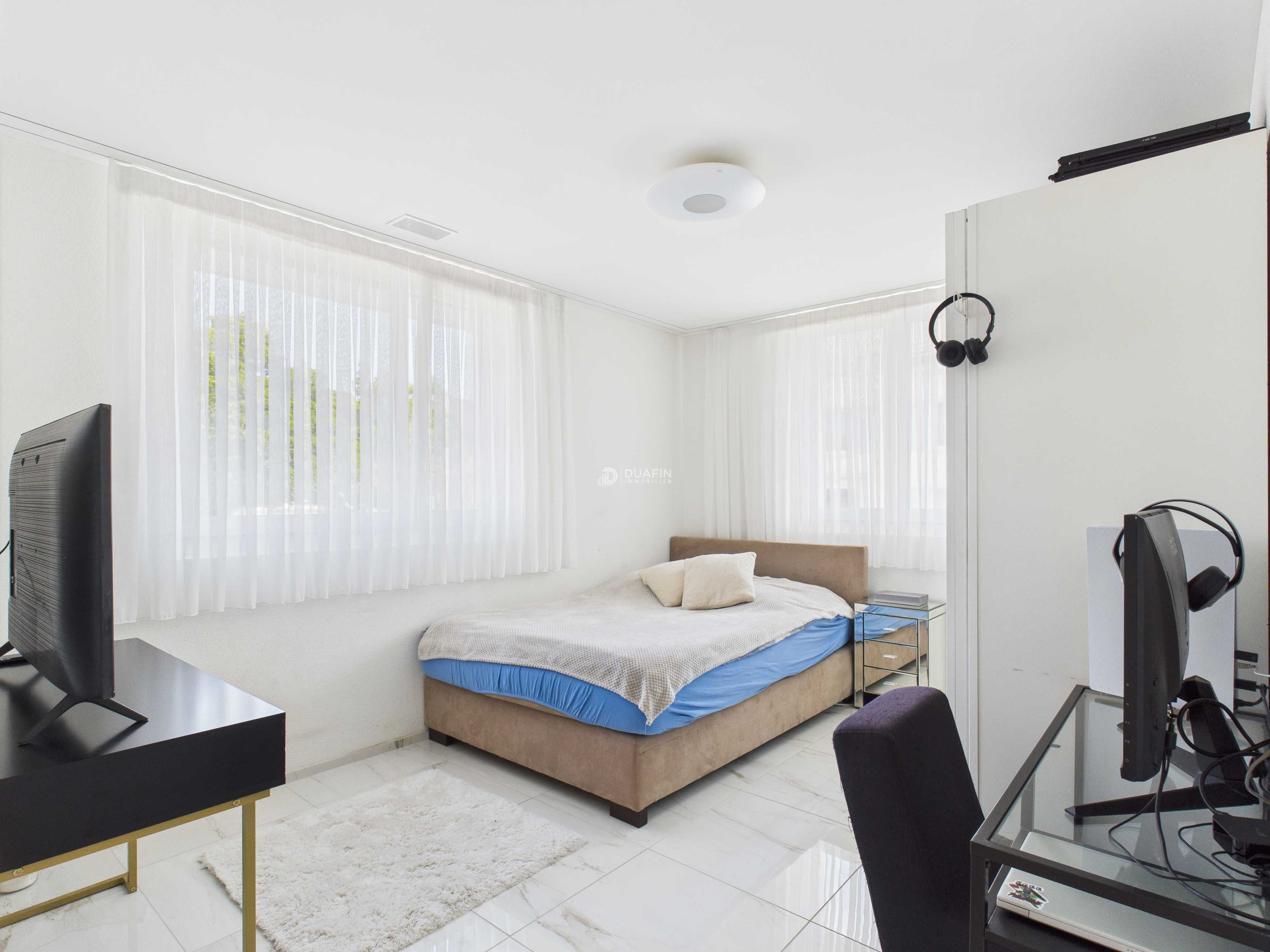 Moderne 4.5-Zi.-Wohnung mit Balkon & 2 TG in Ottenbach kaufen - Bild 4