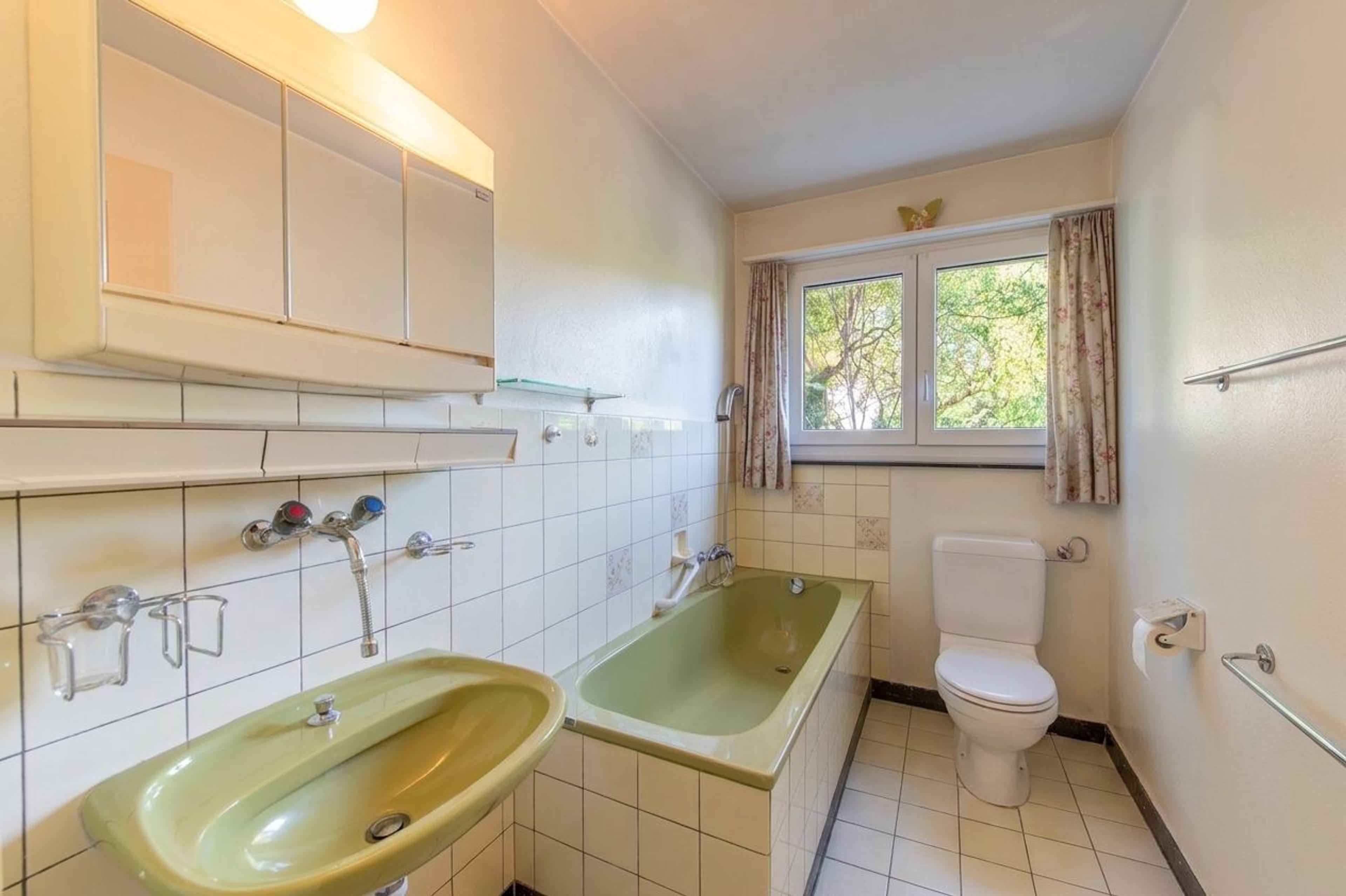 Zentrumsnahes Potenzial: Ausbaubares 5-Zimmer-Einfamilienhaus mit grosszügigem Garten - 10