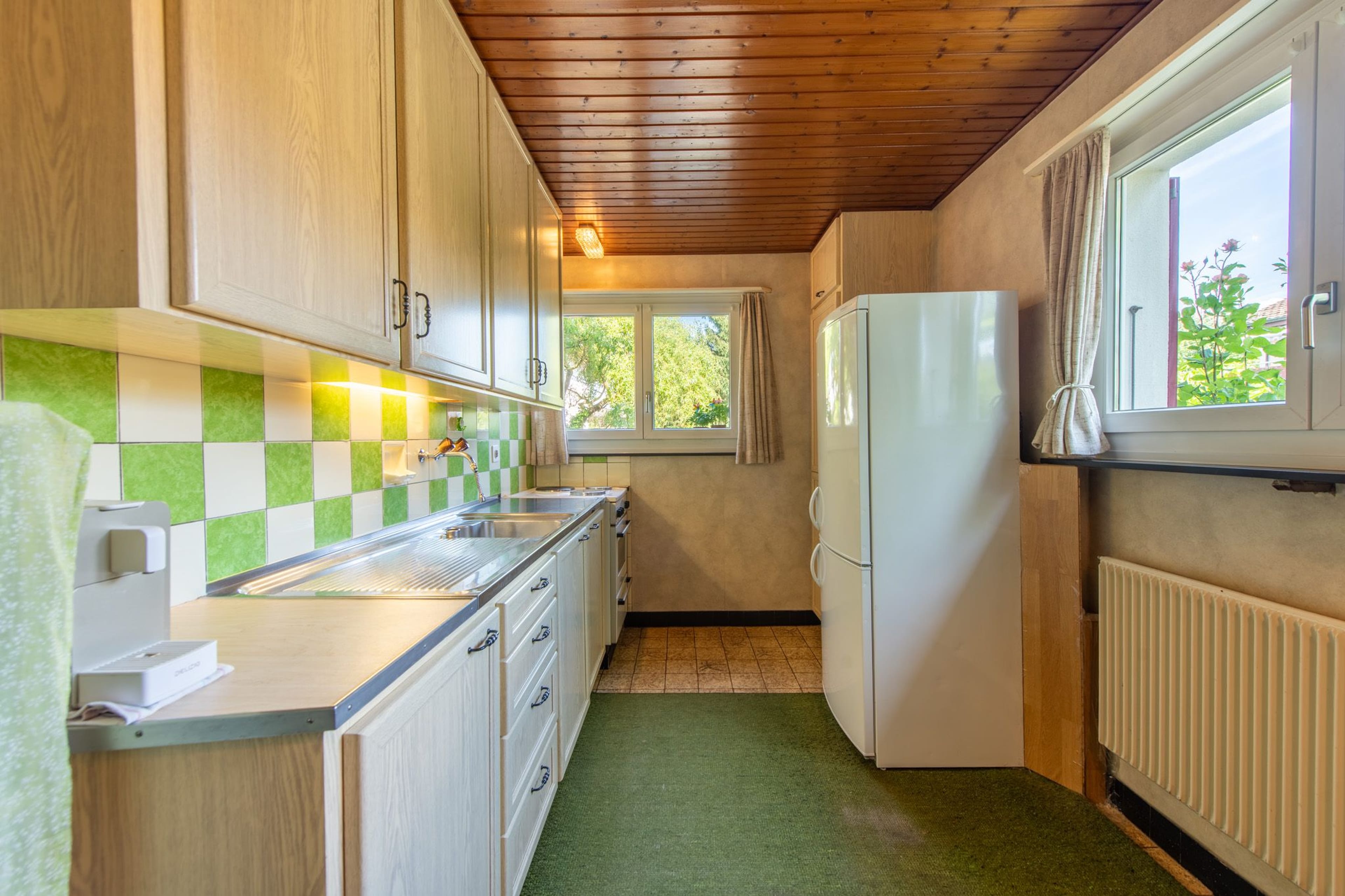 Zentrumsnahes Potenzial: Ausbaubares 5-Zimmer-Einfamilienhaus mit grosszügigem Garten - Bild 5