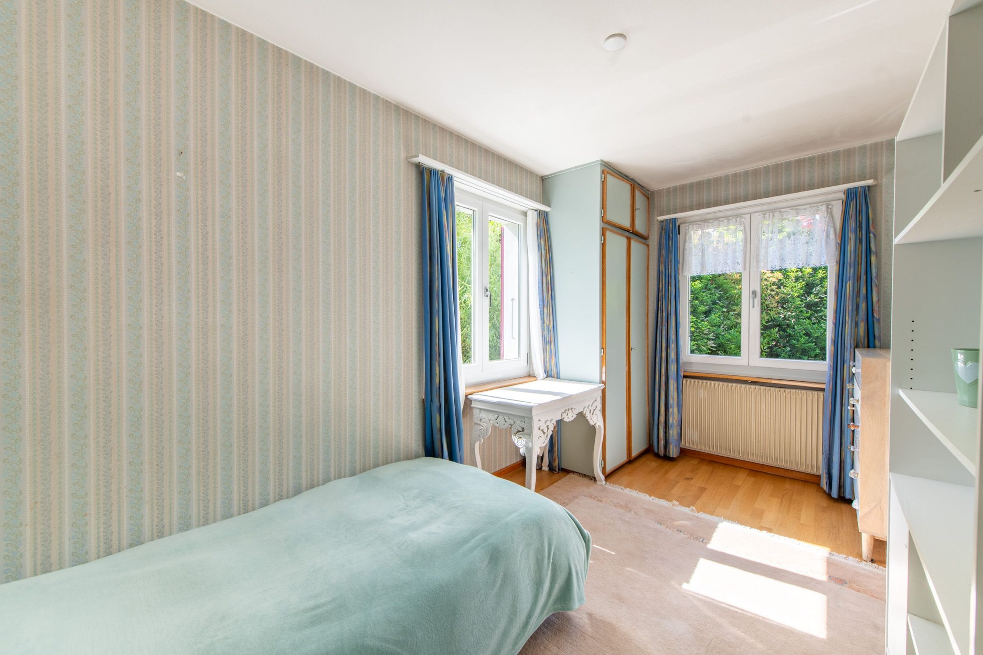 Zentrumsnahes Potenzial: Ausbaubares 5-Zimmer-Einfamilienhaus mit grosszügigem Garten - 8