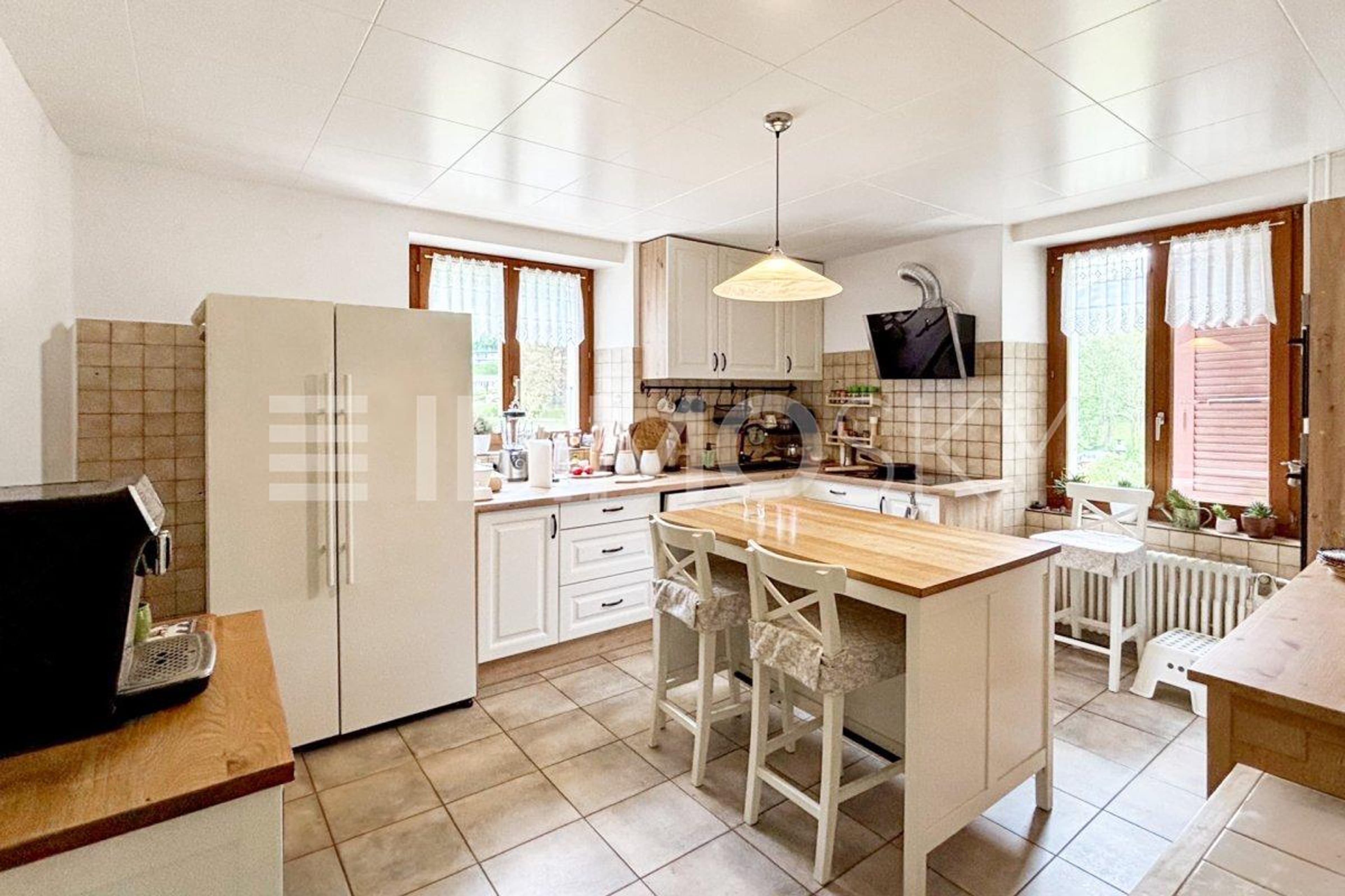 Maison avec 2 appartements à 20 min. de Neuchâtel - Bild 4