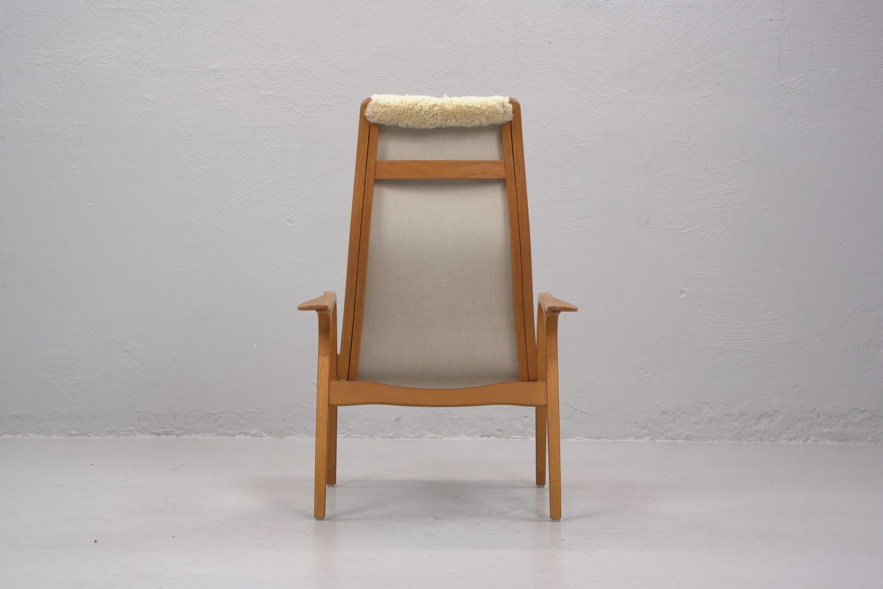 YNGVE EKSTRÖM (1913-1988), fåtölj samt fotpall, 