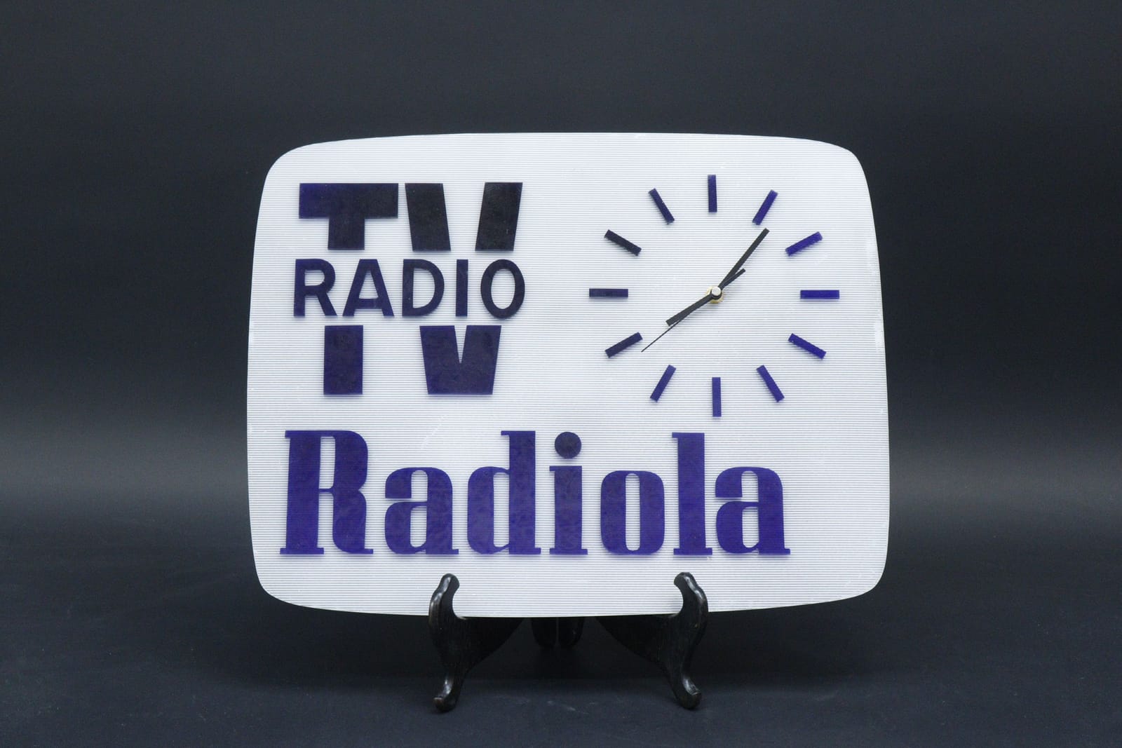 Reklamskylt med klocka, Radiola, plast