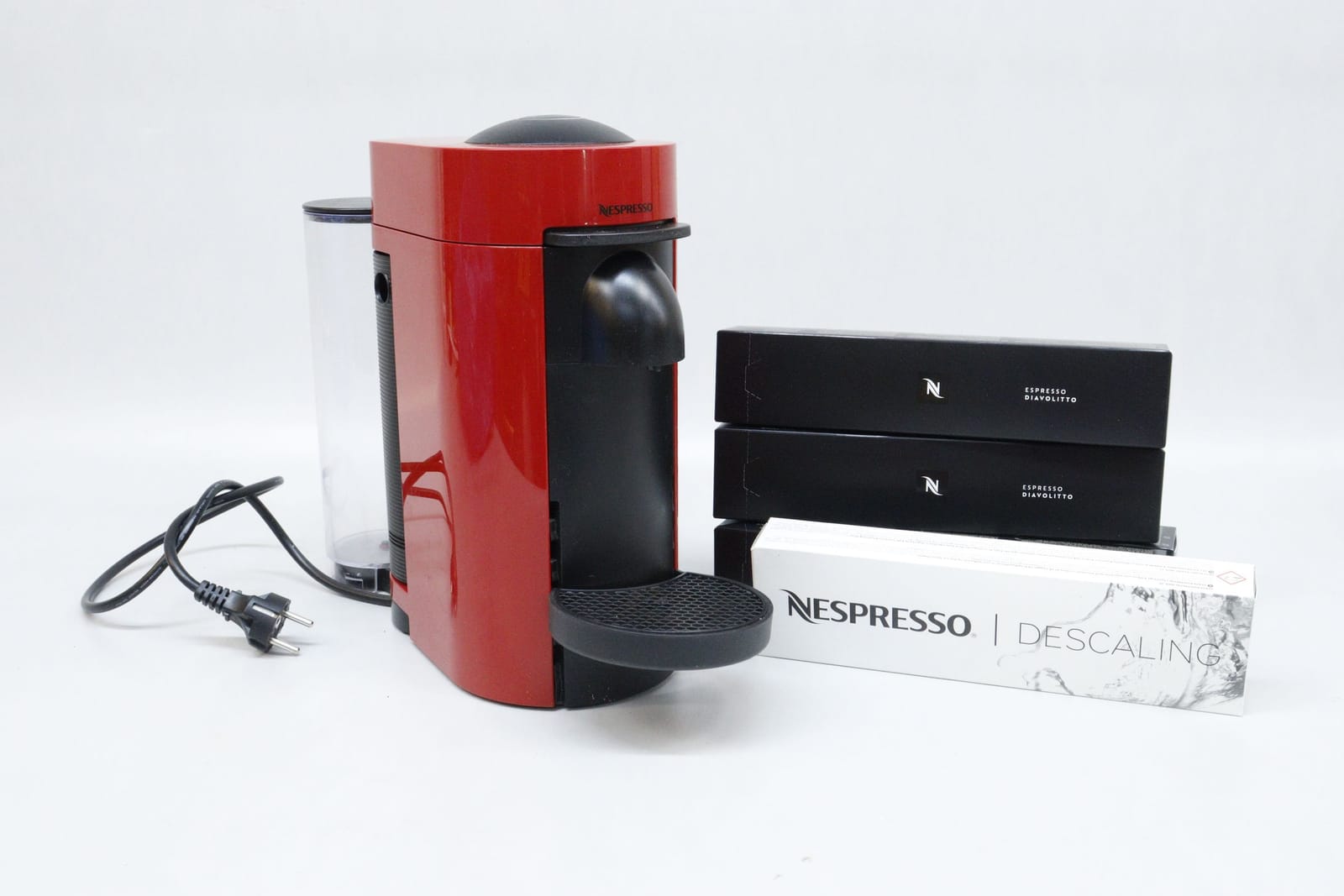 Kaffemaskin, Nespresso, med kapslar och avkalkning