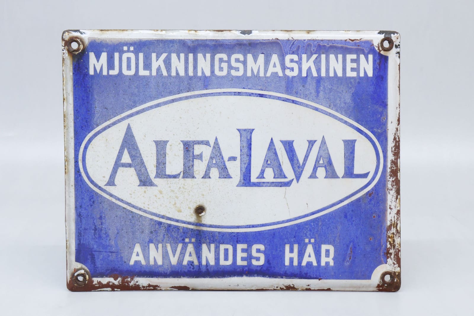 Reklamskylt, Alfa-Lavall mjölkningsmaskin, emaljerad