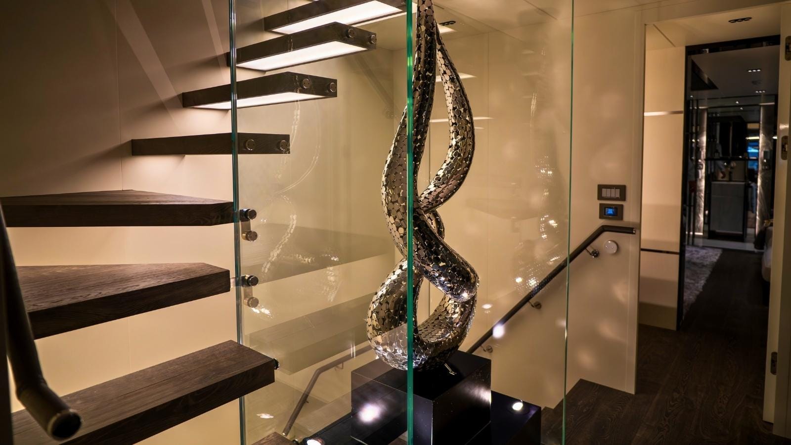 a metal scupluture inside yacht oculus