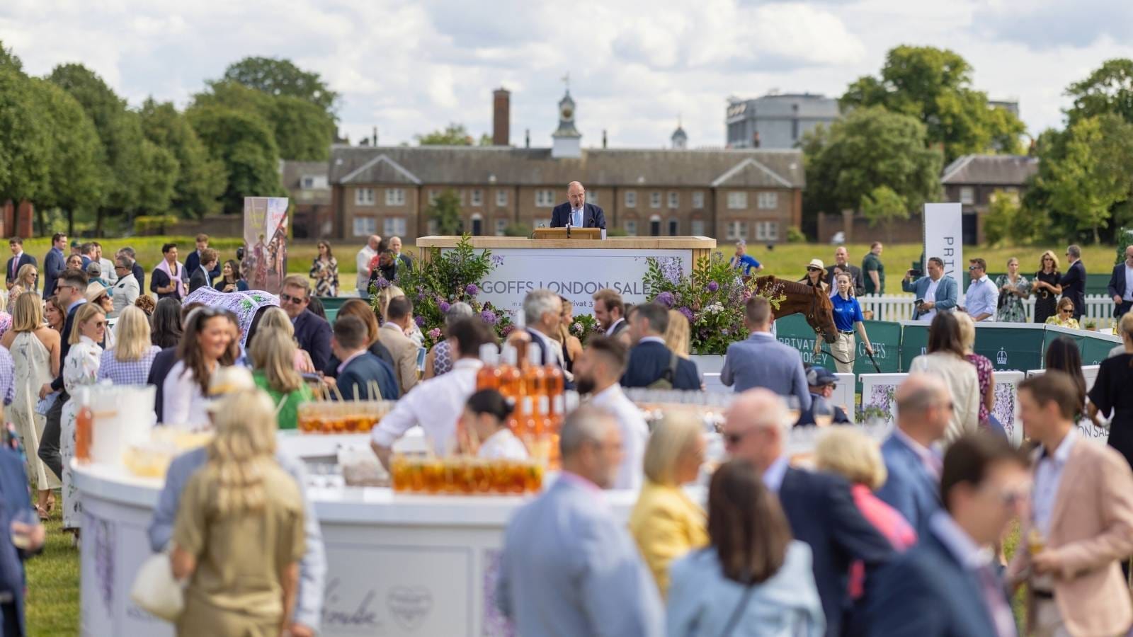 a group of people attending the goffs 2025 in london