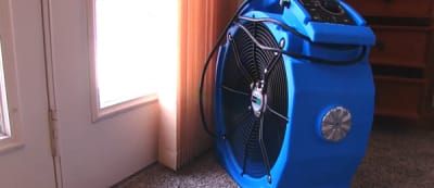Fan set up during a bedbug heat treatment
