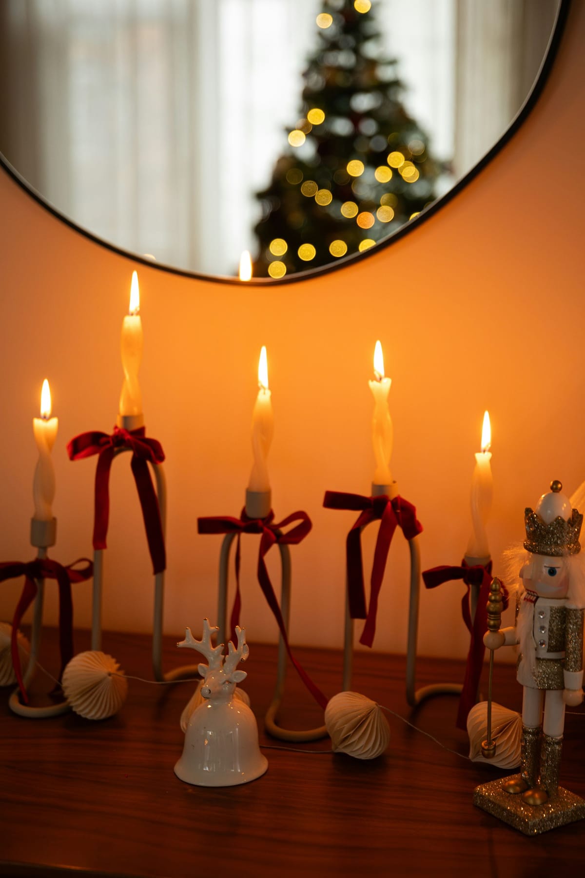 Attitude of Gratitude & Joyful Living | Image of Candles on a stand with a Christmas Tree in the background