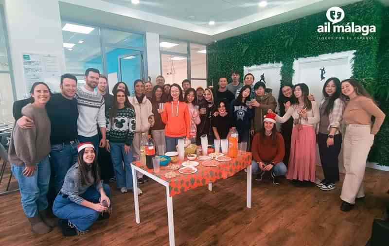 Group celebrating at AIL Málaga, a language travel program in Spain.