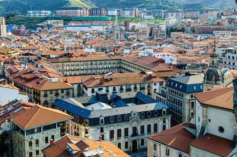 Historic buildings in a Spanish city, perfect for immersive language travel.