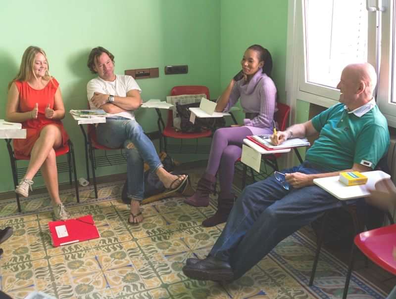 A group of adults participating in a language learning class.