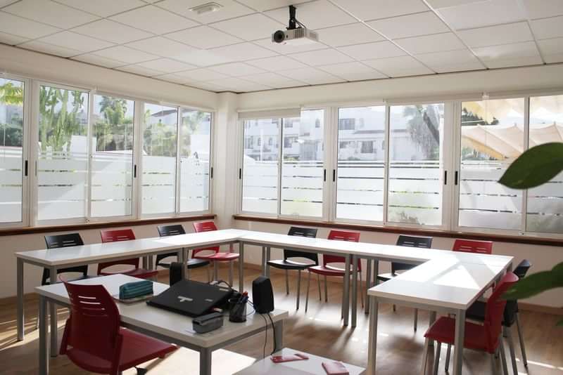 A bright classroom setup, ideal for language learning and cultural exchange.