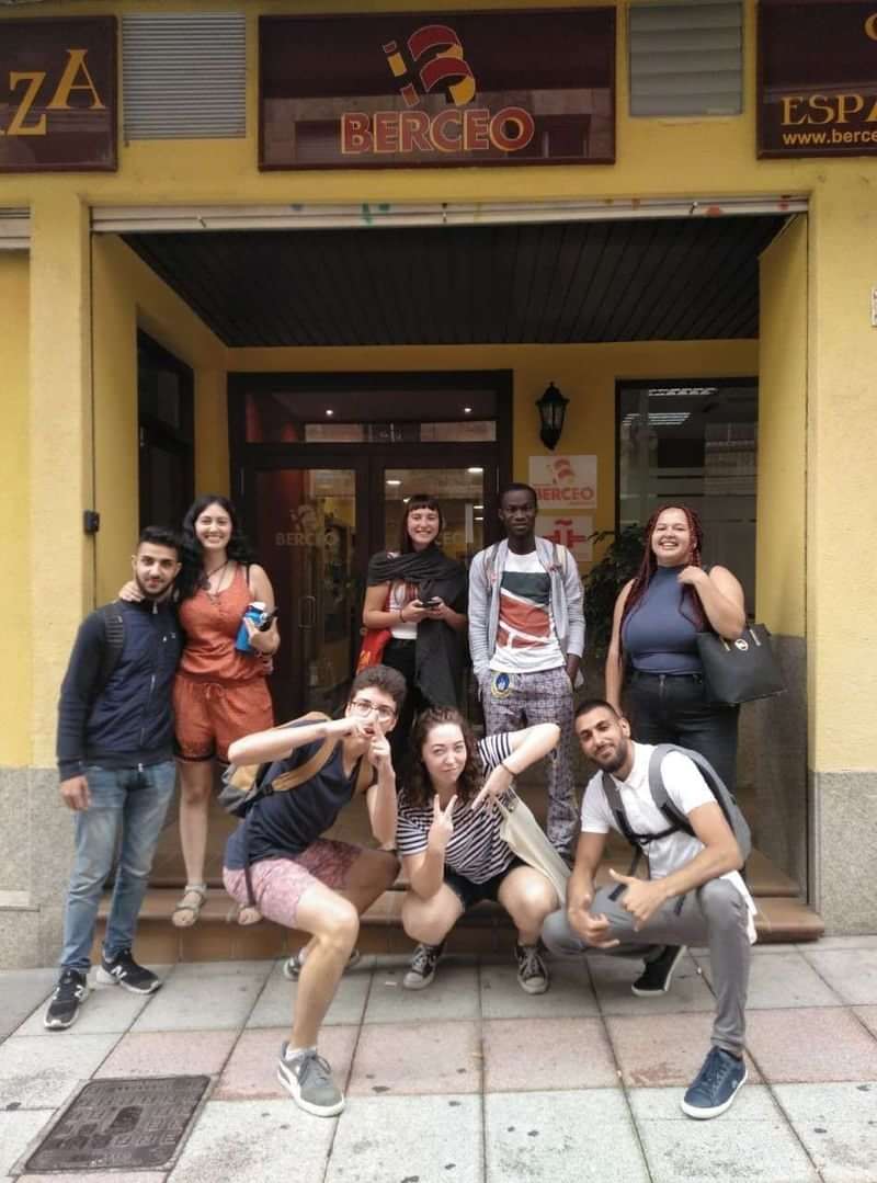 A group of students outside a language school during their travels.