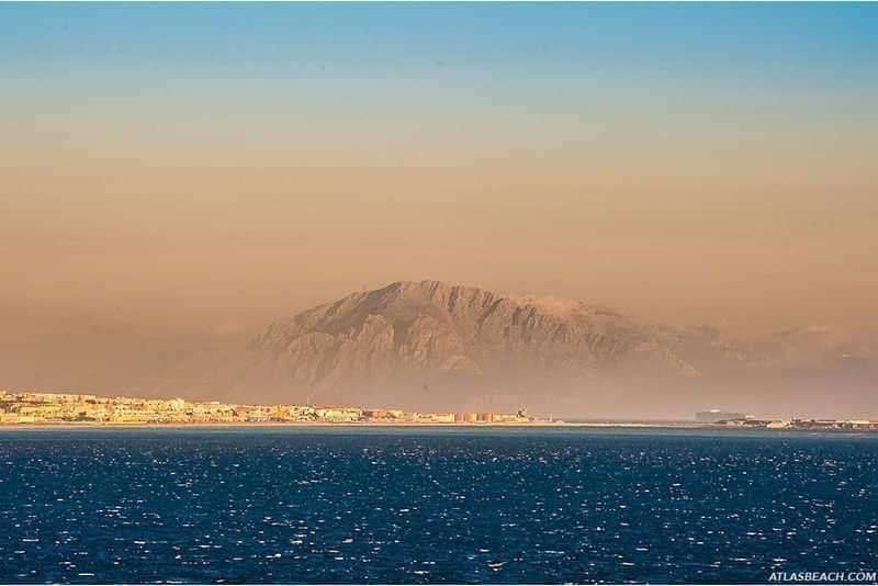 View of mountains and coastline, ideal for immersive language travel experience.