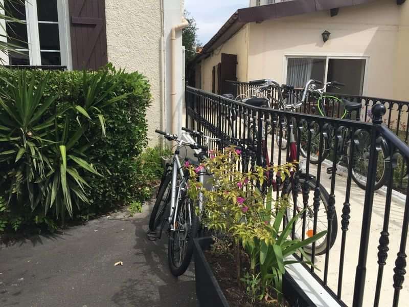 Bicycles parked outside potential language school or guest accommodation.