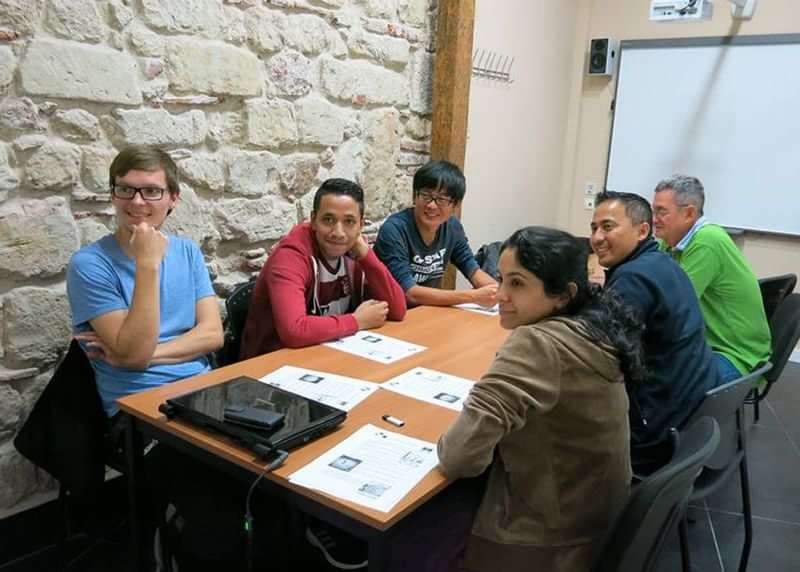 A group of students engaged in a language learning session.