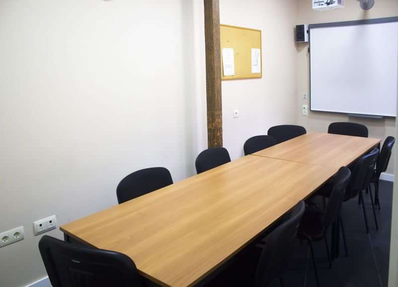 Classroom setup for language classes or travel orientation meetings.