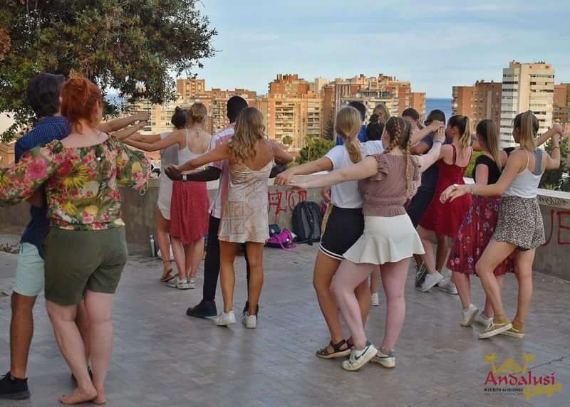 Group dancing during a cultural immersion program in Andalusia, Spain.