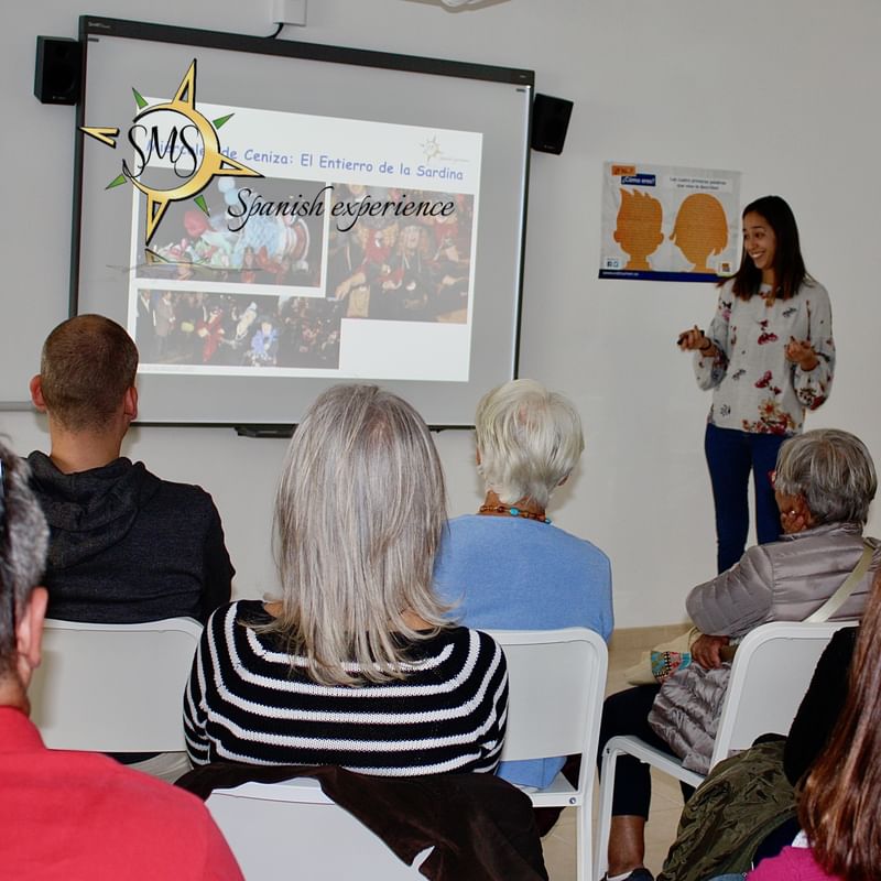 Presentatie over Spaanse cultuur voor een reisgroep in Nederland.