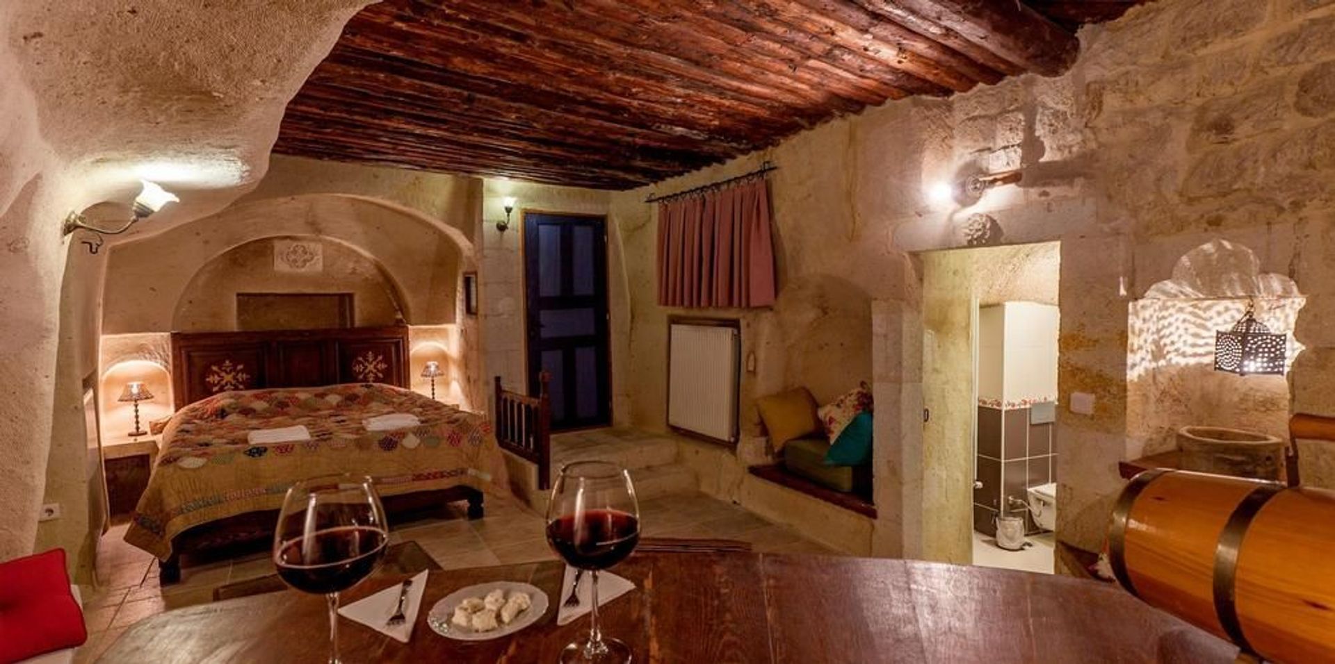 A cave hotel in Urgup with a glass of local wine