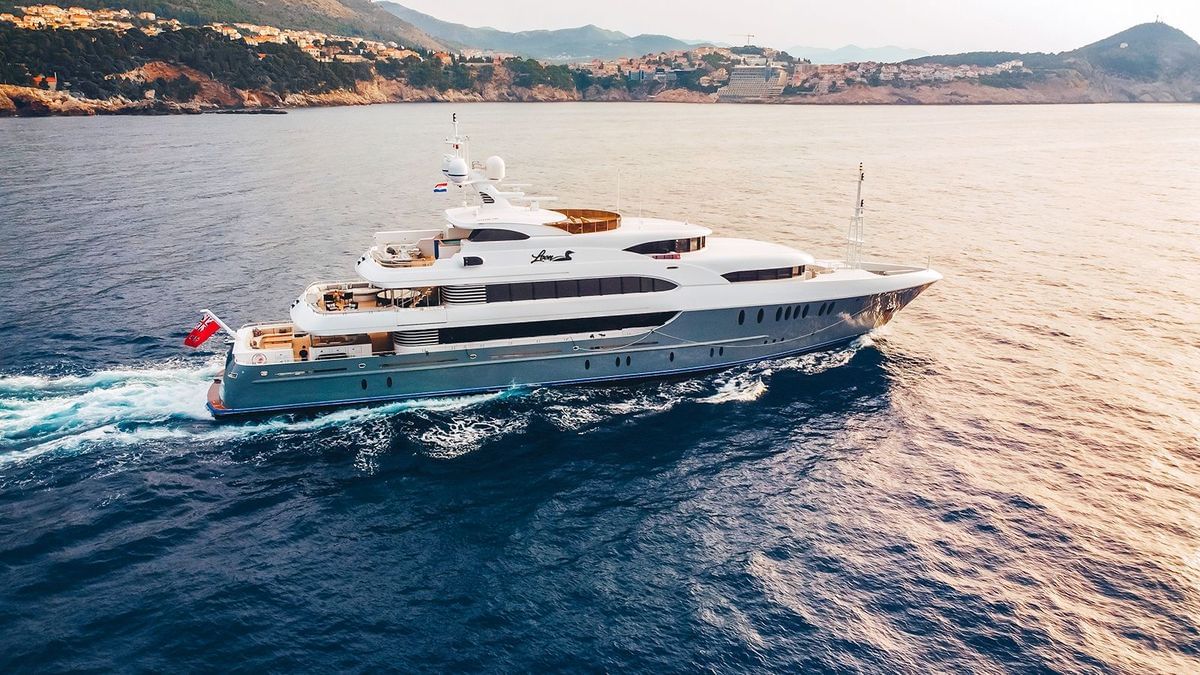 This New 263-Foot Superyacht Has a Grecian-Inspired Beach Club That Belongs  in a 5-Star Hotel