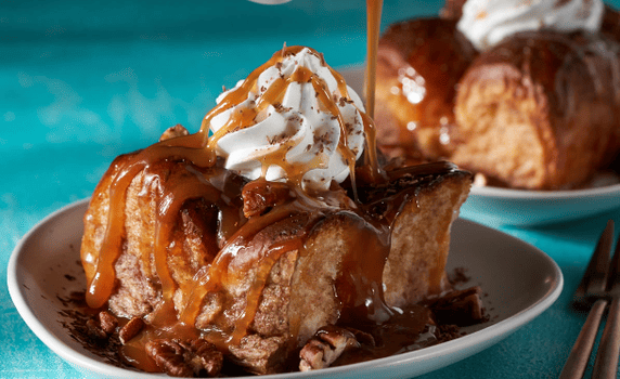 Kona bread pudding on a teal background
