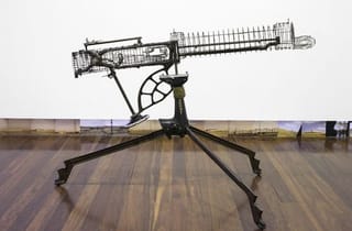 <span class="artist">Bonita Ely</span><span class="title"> Singer Sewing Machine Gun</span><span class="year"> 2013</span>, <span class="medium">Singer sewing machine</span>, <span class="dimen">108 x 143 x 178 cm</span>