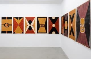 <span class="title"> Installation view of Garrpa/Ground Paintings</span><span class="year"> 2023</span>, <span class="medium">Organic material on paper</span>, <span class="dimen dimen-notes">Set of 24, 120 x 75 cm</span> <span class="title"> Installation view of Garrpa/Ground Paintings</span><span class="year"> 2023</span>, <span class="medium">Organic material on paper</span>, <span class="dimen dimen-notes">Set of 24, 120 x 75 cm</span>