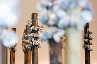 Megan Cope, Kinyingarra Poles, 2024, installation view, to come together as water, The University of Queensland Art Museum, 2025. Photograph by Joe Ruckli Megan Cope, Kinyingarra Poles, 2024, installation view, to come together as water, The University of Queensland Art Museum, 2025. Photograph by Joe Ruckli