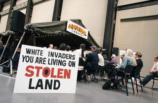 <span class="artist">Richard Bell</span><span class="title"> Installation view, &#039;Embassy&#039;</span><span class="year"> 2023</span>, <span class="dimen dimen-notes">Dimensions variable</span>, <span class="notes">Tate Modern Turbine Hall, London</span>