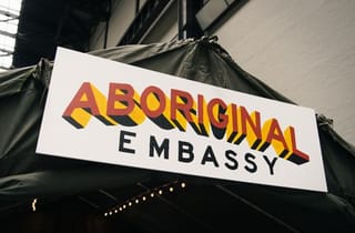 <span class="artist">Richard Bell</span><span class="title"> Installation view, &#039;Embassy&#039;</span><span class="year"> 2023</span>, <span class="dimen dimen-notes">Dimensions variable</span>, <span class="notes">Tate Modern Turbine Hall, London</span>