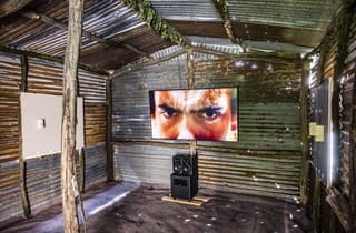 <span class="artist">Richard Bell</span><span class="title"> No Tin Shack</span><span class="year"> 2022</span>, <span class="medium">video, colour, sound</span>, <span class="dimen dimen-notes">7:42 min, looped</span>, <span class="notes">Installation view, ESPRESSIONI CON FRAZIONI, Castello di Rivoli, Turin. Photo by Andrea Guermani.</span> <span class="artist">Richard Bell</span><span class="title"> No Tin Shack</span><span class="year"> 2022</span>, <span class="medium">video, colour, sound</span>, <span class="dimen dimen-notes">7:42 min, looped</span>, <span class="notes">Installation view, ESPRESSIONI CON FRAZIONI, Castello di Rivoli, Turin. Photo by Andrea Guermani.</span>