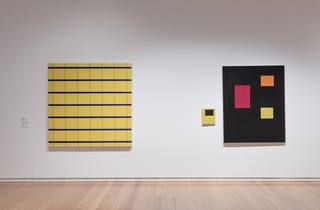 <span class="title"> Installation view, Minimal with work by Ian Burn, Yellow/blue equivalence (second premiss) 1965, synthetic polymer paint on cotton duck, 165.3 x 164.7 cm, Geelong Gallery, 2026, photographer: Andrew Curtis</span>