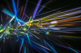 <span class="artist">Ross Manning</span><span class="title"> Dichroic Filter Piece (extended projection) (detail)</span><span class="year"> 2013</span>, <span class="medium">Dichroic filters, cut glass, DVD players and projectors</span>, <span class="dimen dimen-notes">Variable</span>, <span class="notes">Perth Institute of Contemporary Arts</span>