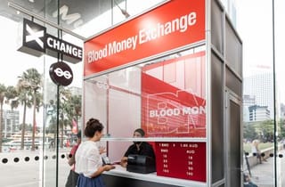 <span class="artist">Ryan Presley</span><span class="title"> Blood Money Currency Exchange Terminal</span><span class="year"> 2018</span>, <span class="medium">Mixed media installation and performance</span>, <span class="dimen">3 x 4 x 3 cm</span>, <span class="notes">Installed at MCA, Sydney. Image by Jacquie Manning.</span>