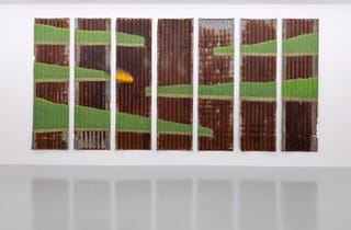 <span class="artist">Sancintya Mohini Simpson</span><span class="title"> kotri / barkis</span><span class="year"> 2023-26</span>, <span class="medium">Acrylic and enamel paint on corrugated iron</span>, <span class="dimen dimen-notes">9 panels: 90 x 67 cm each, Installed dimensions: 90 x 485 cm</span>