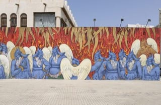 <span class="artist">Khadim Ali</span><span class="title"> Standing Flames</span><span class="year"> 2019</span>, <span class="medium">Acrylic, industrial paints, Dutch metal gold leaves on MDF</span>, <span class="dimen dimen-notes">1785 x 539 cm</span>, <span class="notes">Installation view: Sharjah Biennial 14: ‘Leaving the Echo<br />
Chamber’. Commissioned by Sharjah Art Foundation. Courtesy of the artist, Sharjah Art Foundation and Milani Gallery.</span>