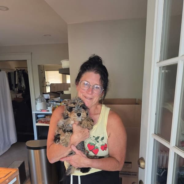 Melanie M. with Jasper, a Cavapoo puppy