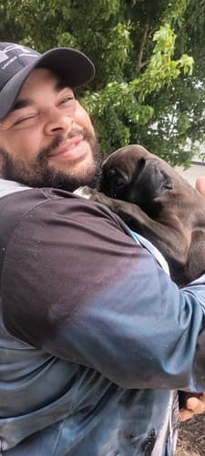 Pawrade customer Adam G. with their Boxer puppy