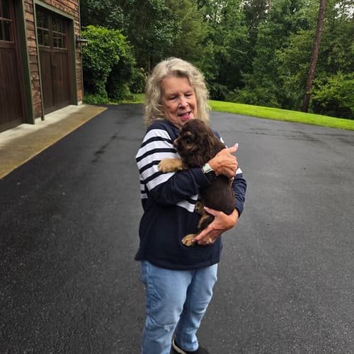 Pawrade customer Donna S. with their Cocker Spaniel puppy