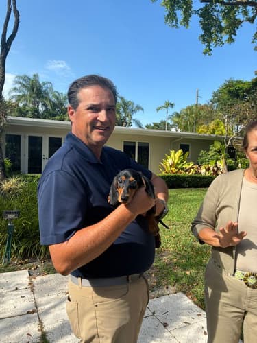 Pawrade customer Adriana U. with their Dachshund puppy