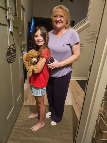 Pawrade customer Diana G. with their Goldendoodle, Mini puppy